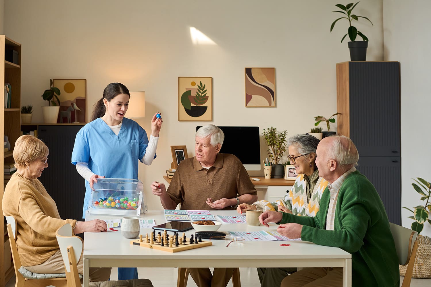 Seniors and caregiver enjoying a group activity