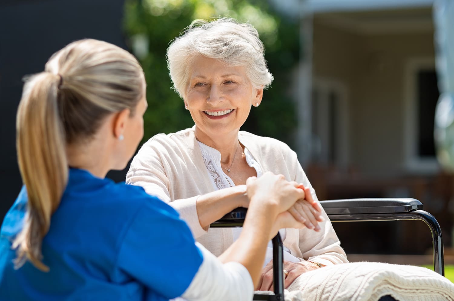 Nurse caring for an elderly woman
